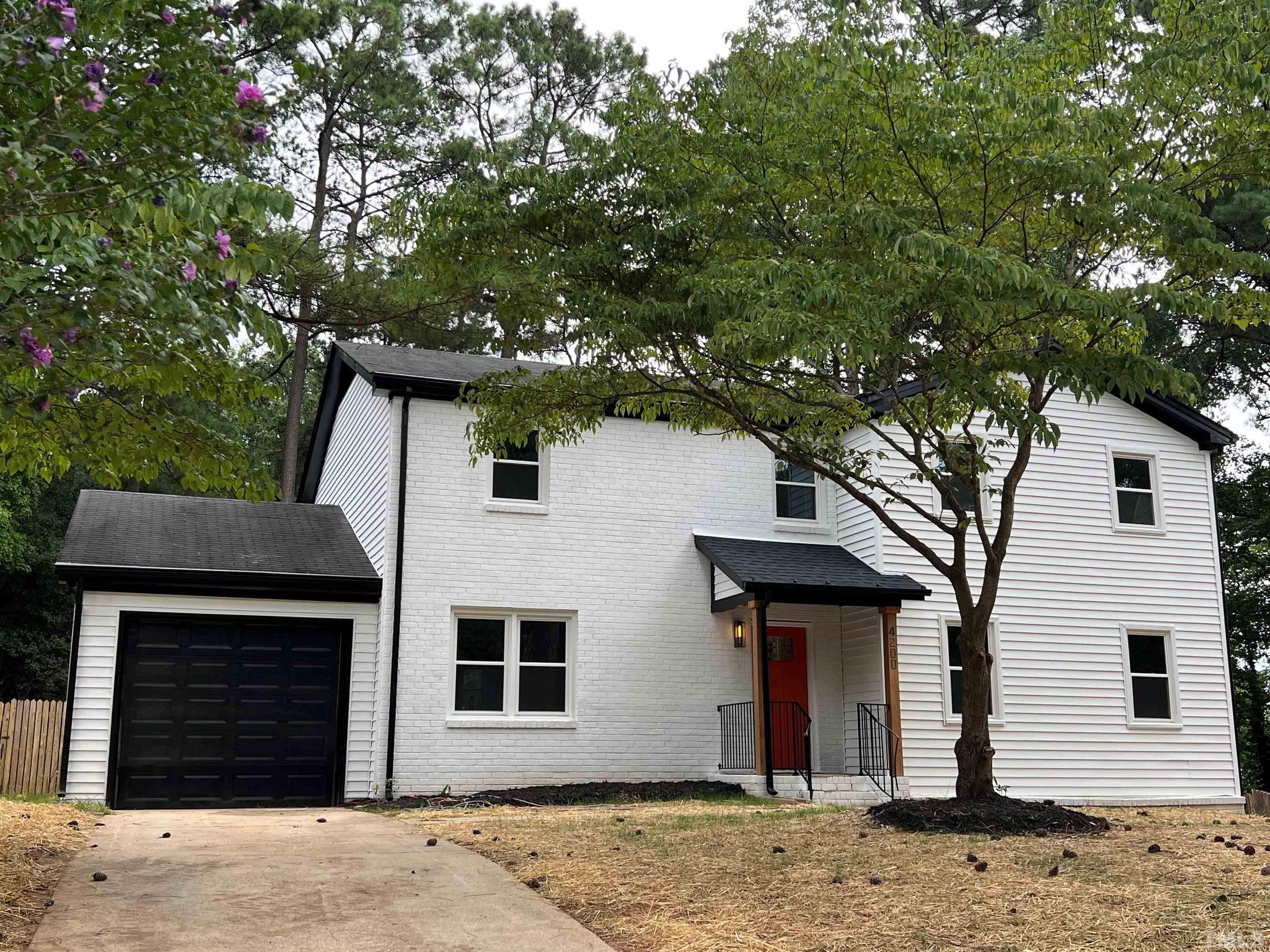 4200 Pickwick Drive Raleigh, NC 27613 - Photo 1 of 36 a front view of a house
