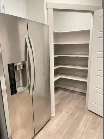 an empty room with a bench