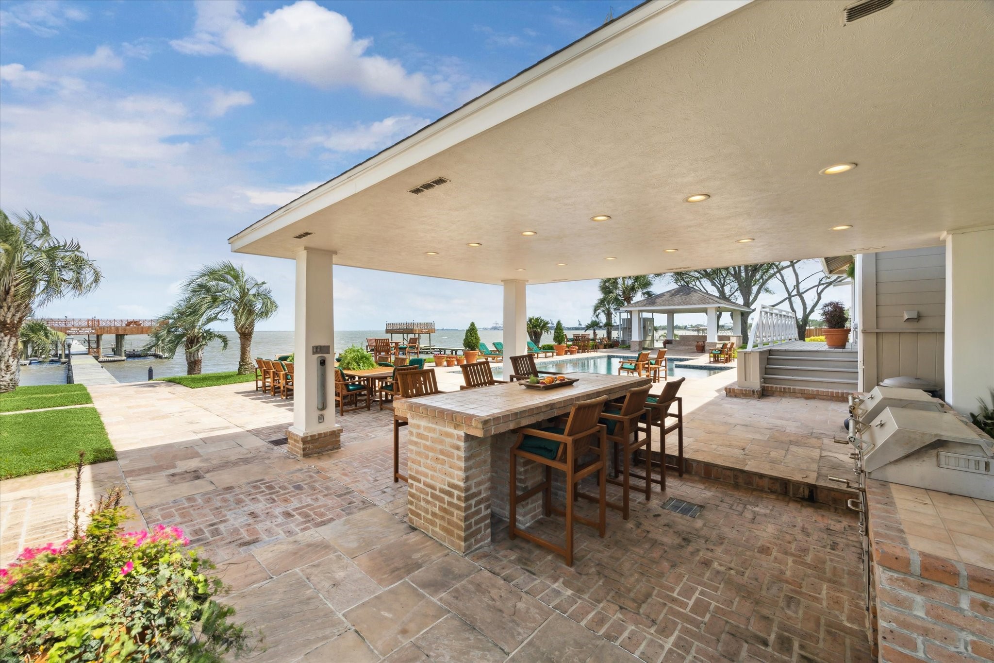 102 South R Street La Porte, TX 77571 - Photo 23 of 43 Covered dining area outside main house, adjacent to the pool.