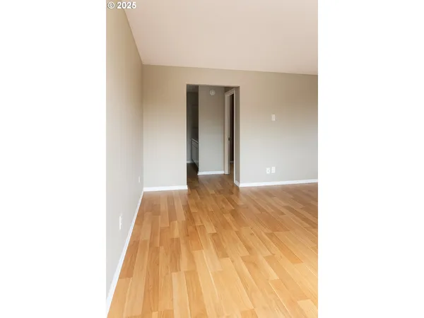 a view of a room that has a window in it