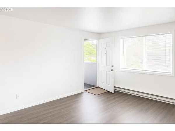 a kitchen with stainless steel appliances a refrigerator and a stove