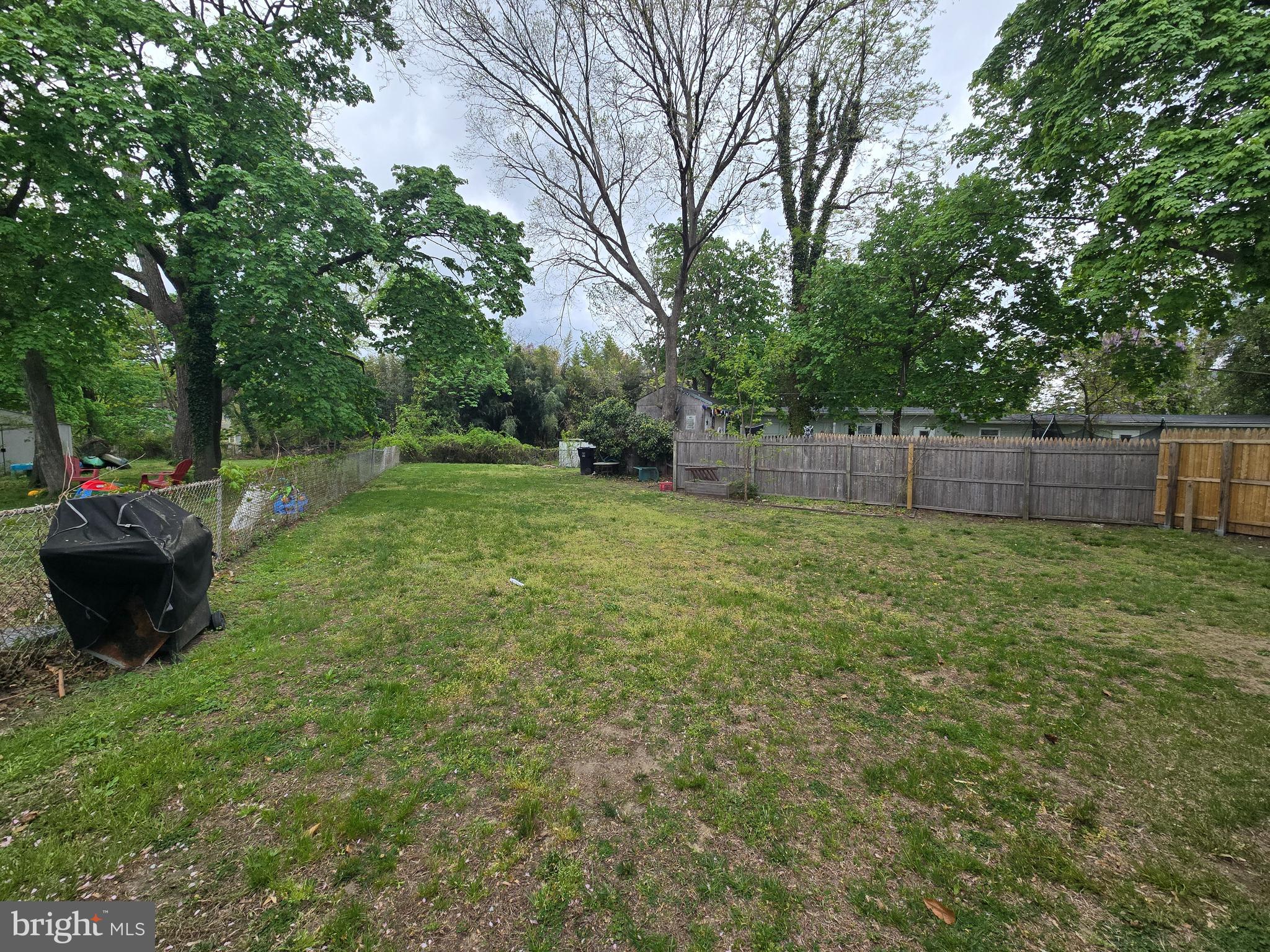 106 Main Street Mantua, NJ 08051 - Photo 22 of 23 a view of a backyard with a garden and entertaining space