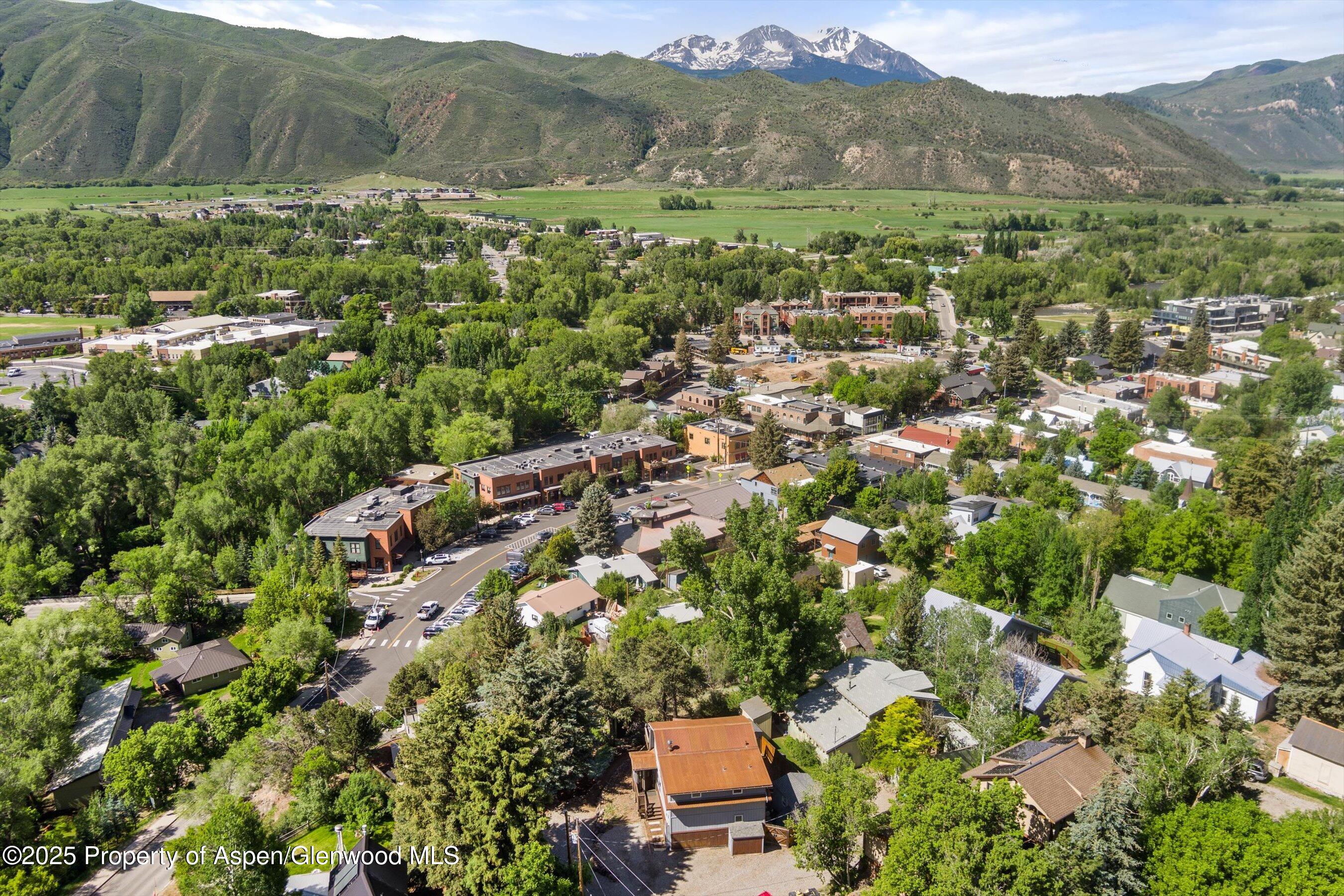 a view of a city with mountain