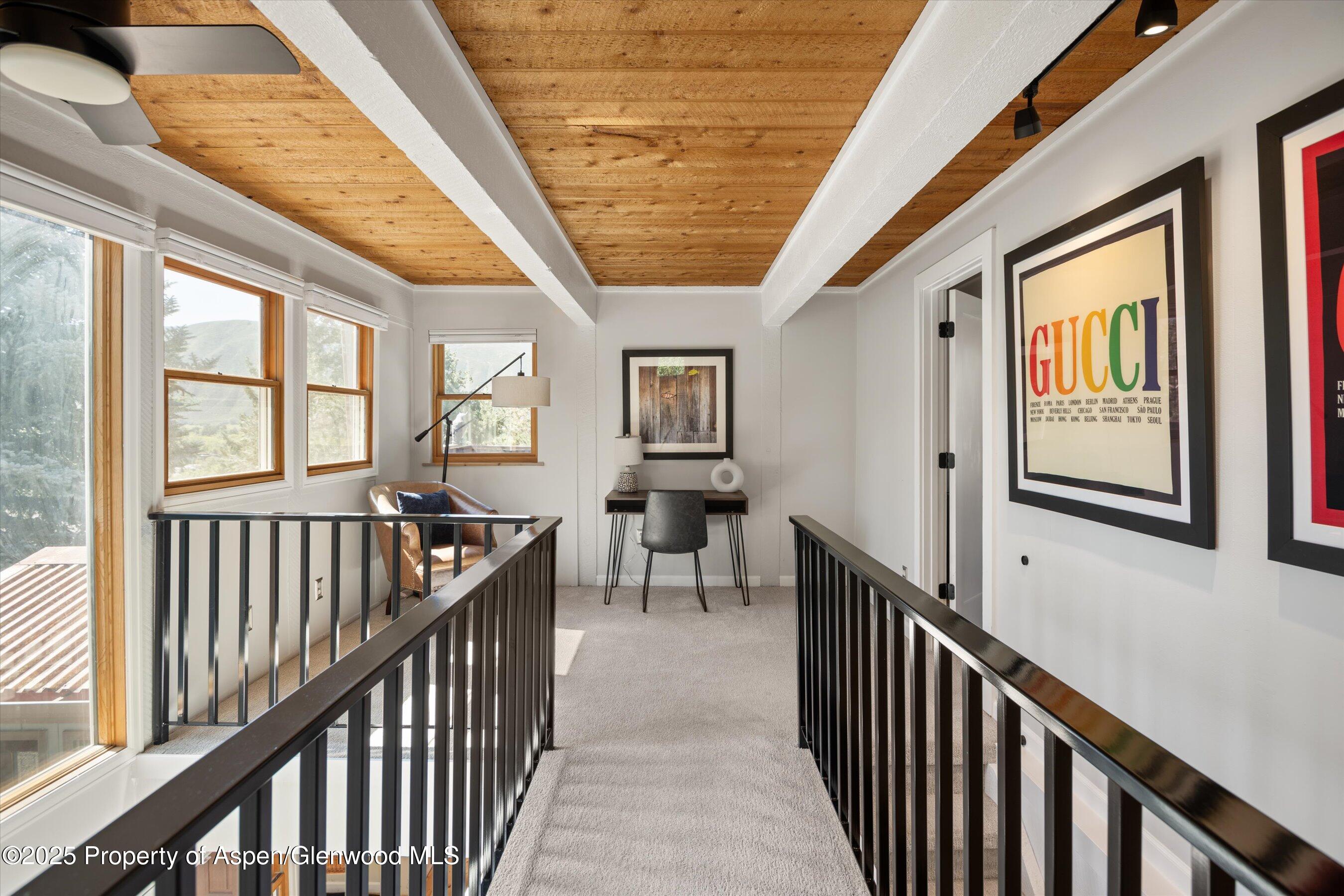 217 Longhorn Lane Basalt, CO 81621 - Photo 12 of 23 a view of a porch with wooden floor and windows