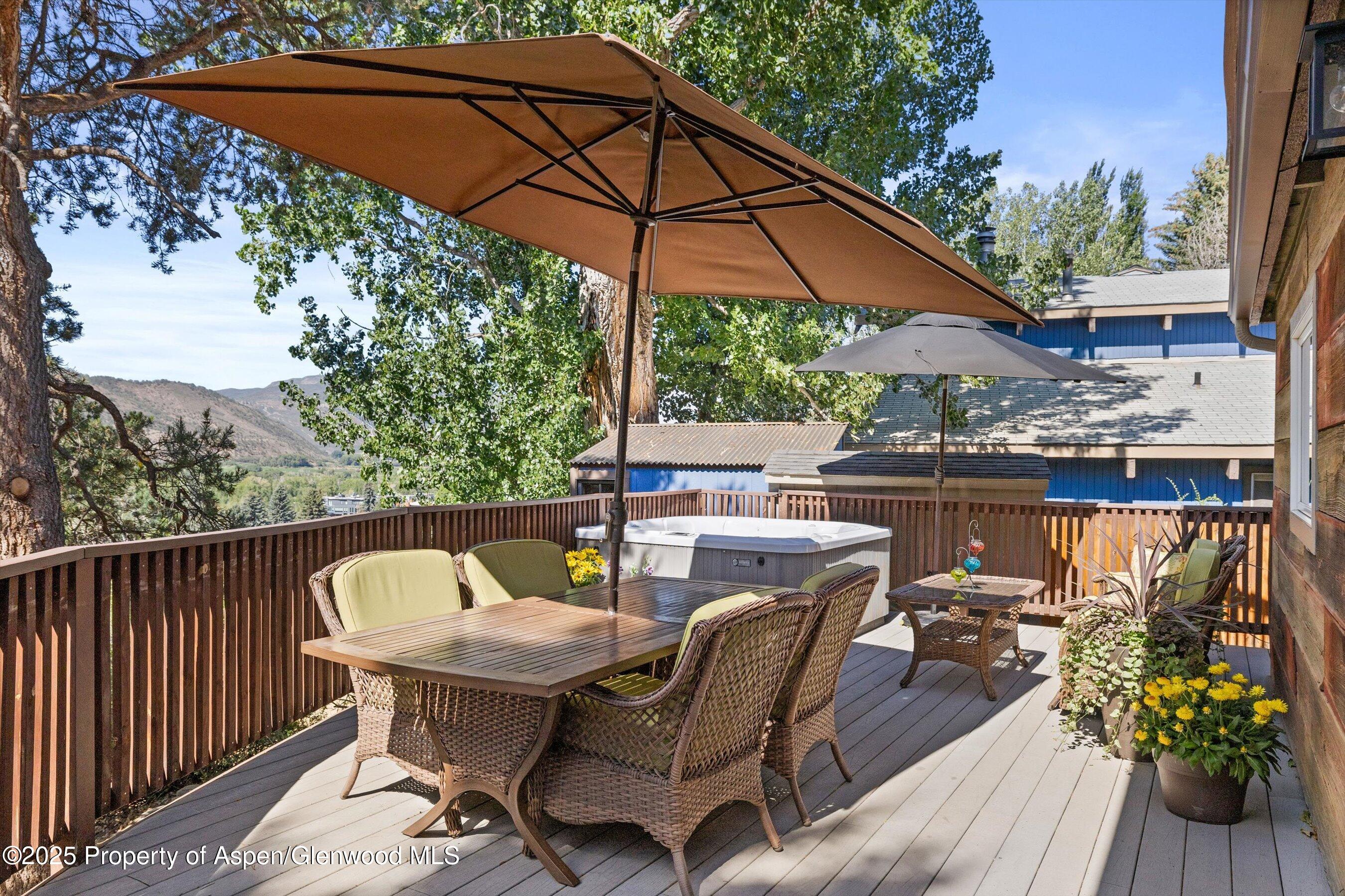 217 Longhorn Lane Basalt, CO 81621 - Photo 19 of 23 a view of a balcony with furniture and umbrella