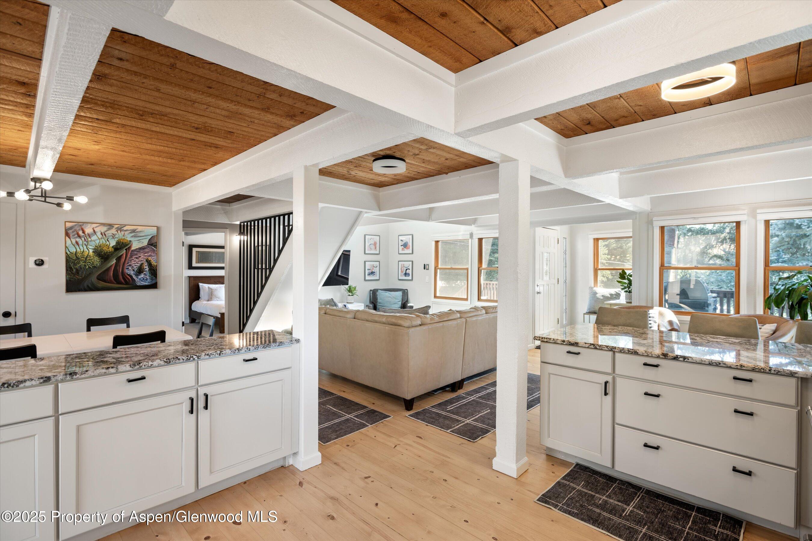 217 Longhorn Lane Basalt, CO 81621 - Photo 8 of 23 a very nice looking room with wooden floors and a window