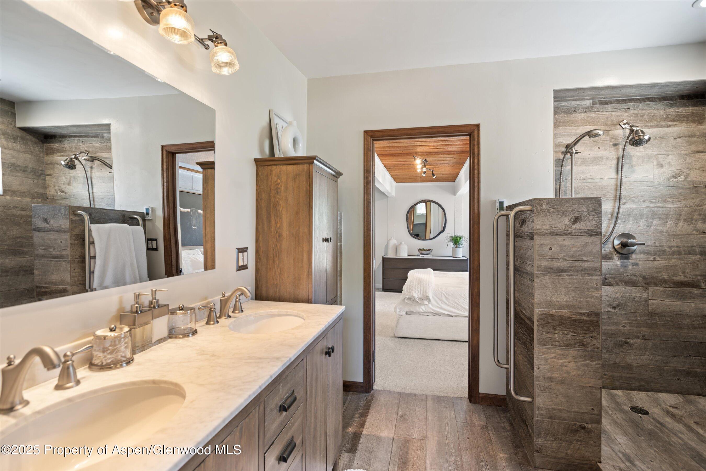 217 Longhorn Lane Basalt, CO 81621 - Photo 10 of 23 a en suite bathroom with a granite countertop sink mirror and shower