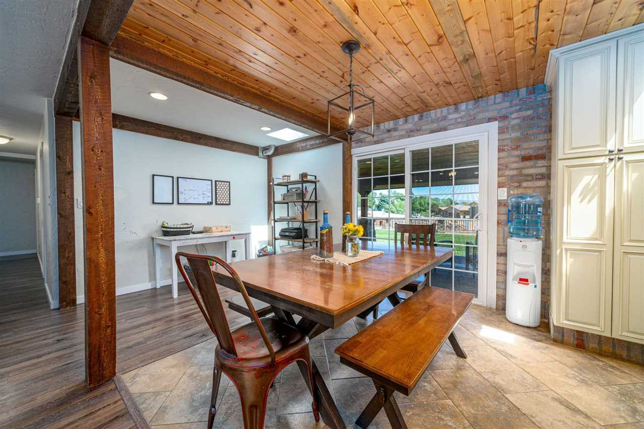 2330 E Road, Unit A & B Grand Junction, CO 81507 - Photo 14 of 35 a dining room with furniture and window