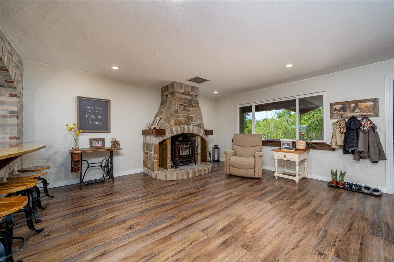 2330 E Road, Unit A & B Grand Junction, CO 81507 - Photo 16 of 35 a living room with furniture and a fireplace