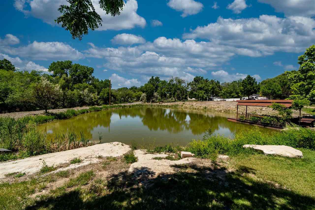 2330 E Road, Unit A & B Grand Junction, CO 81507 - Photo 2 of 35 a view of a lake in front of house and outdoor space