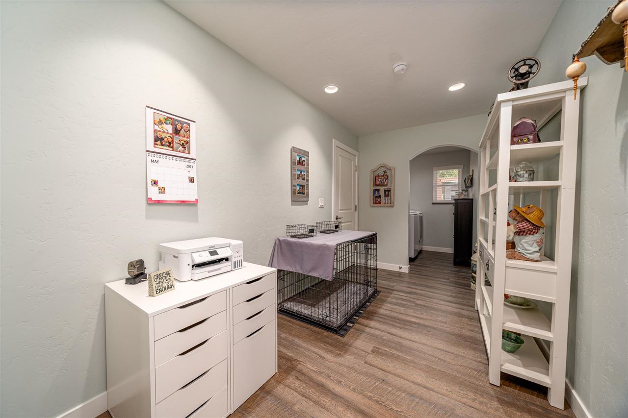 2330 E Road, Unit A & B Grand Junction, CO 81507 - Photo 27 of 35 a room with furniture and a wooden floor