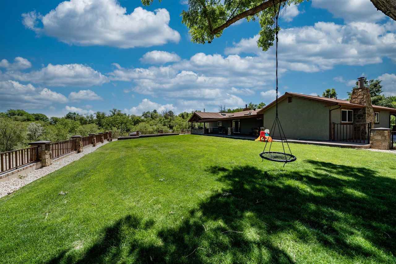 2330 E Road, Unit A & B Grand Junction, CO 81507 - Photo 4 of 35 a view of a garden with a slide