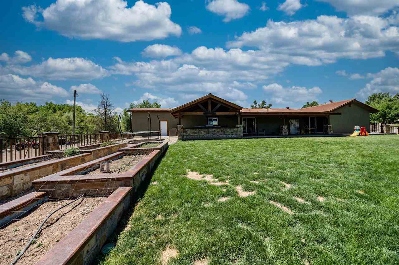 2330 E Road, Unit A & B Grand Junction, CO 81507 - Photo 5 of 35 a view of a house with a backyard