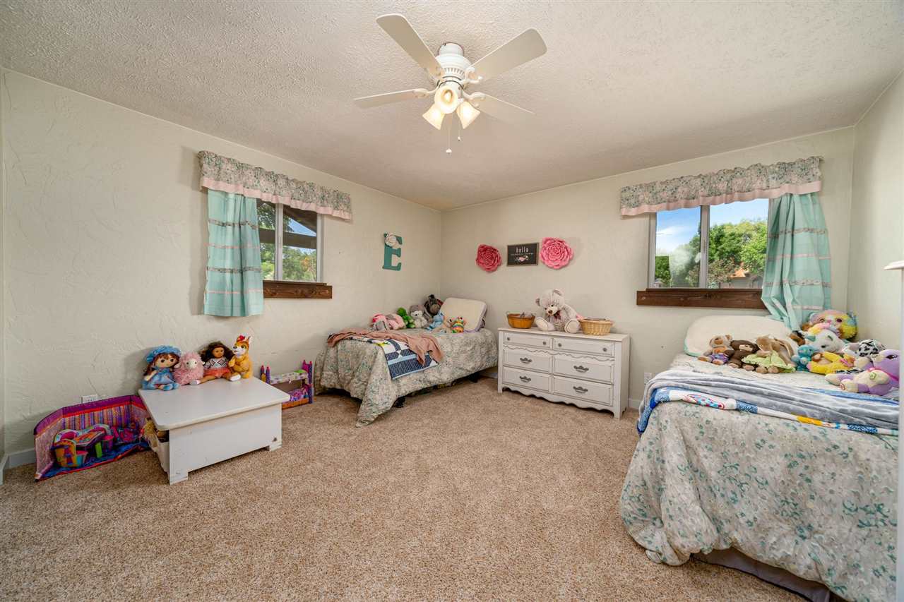 2330 E Road, Unit A & B Grand Junction, CO 81507 - Photo 10 of 35 a bedroom with furniture and a bed