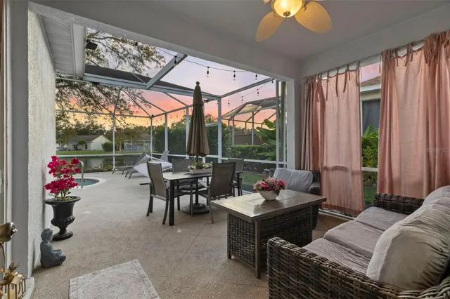 a living room with furniture and window
