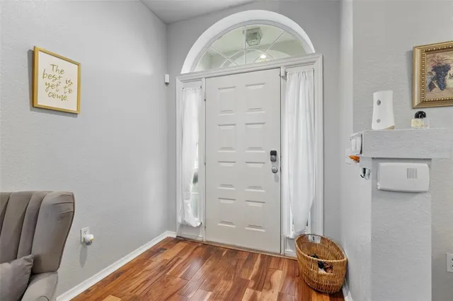 a view of livingroom with furniture and wooden floor