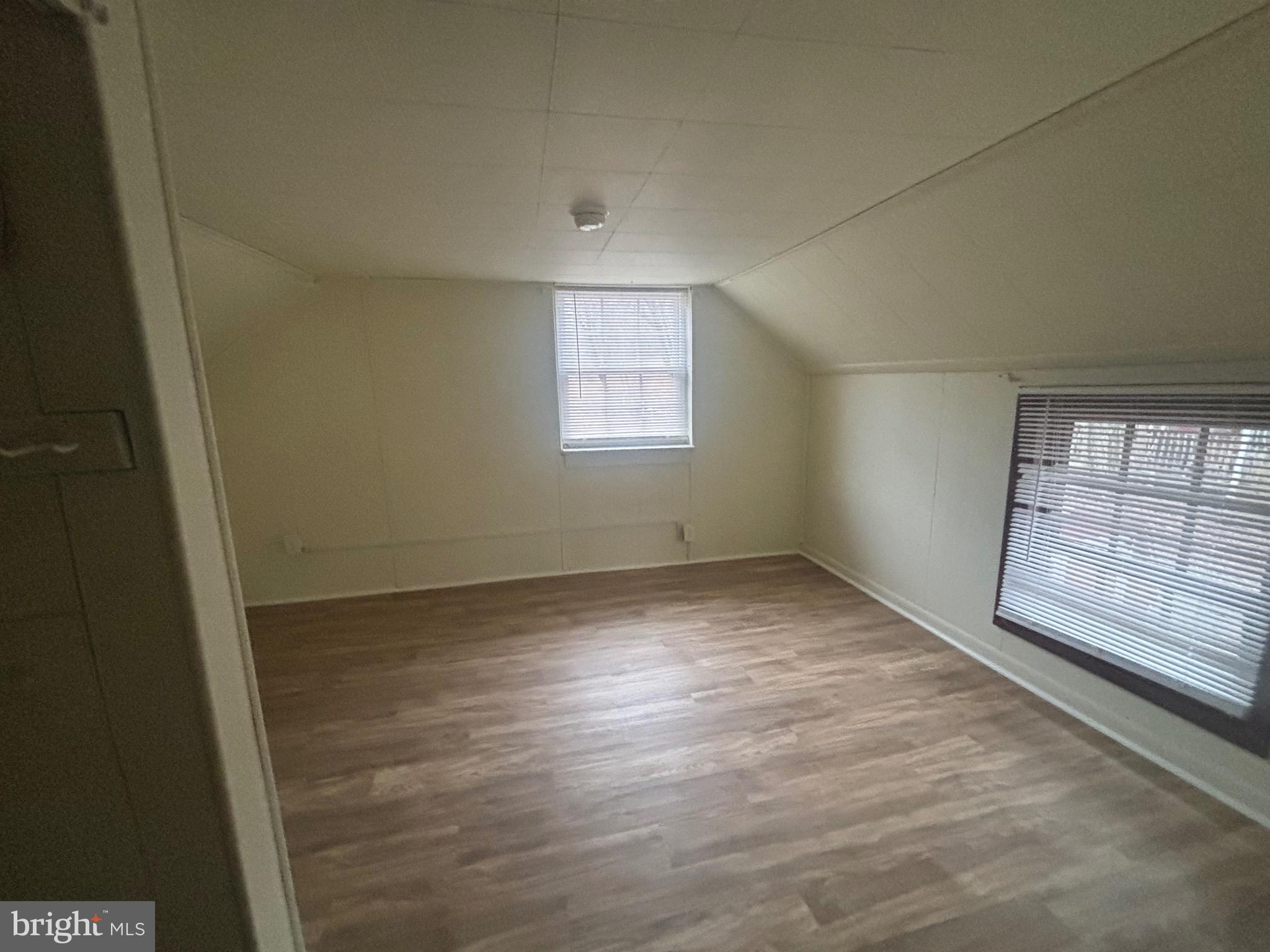 91 Middle Road Elkton, MD 21921 - Photo 8 of 11 wooden floor in an empty room with a window