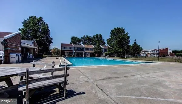 a view of a yard with sitting area
