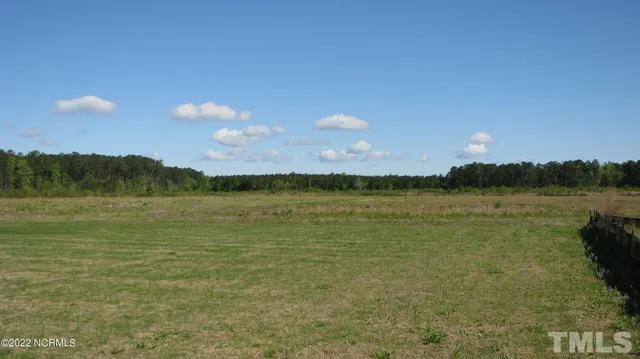 a view of lake with sunset
