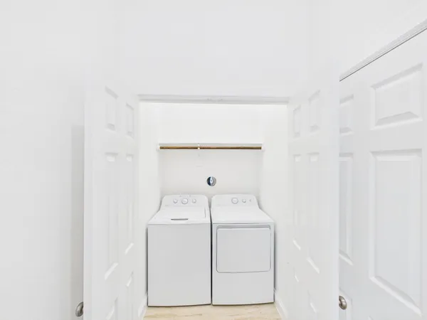 a utility room with dryer and washer