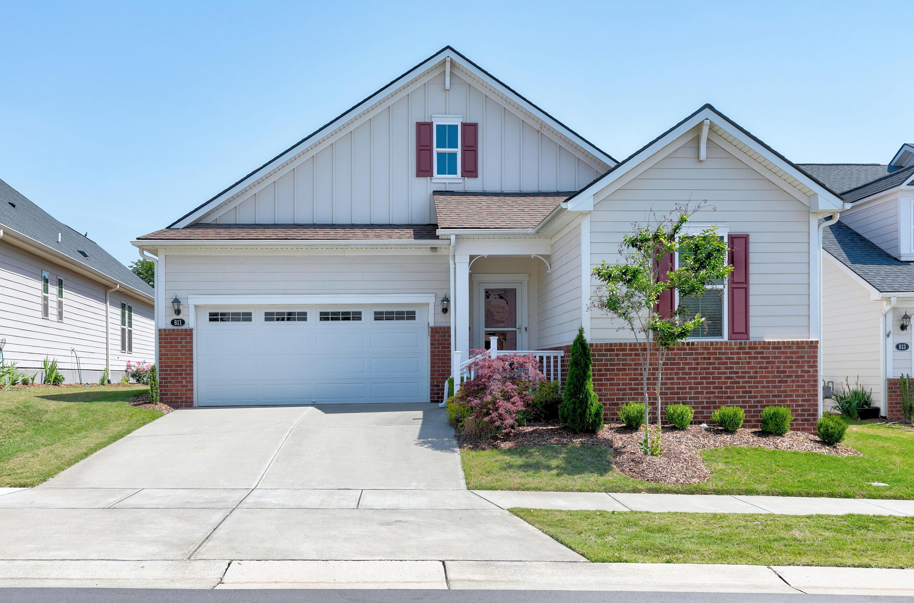 811 Atticus Way Durham, NC 27703 - Photo 1 of 33 a front view of house with garage and yard