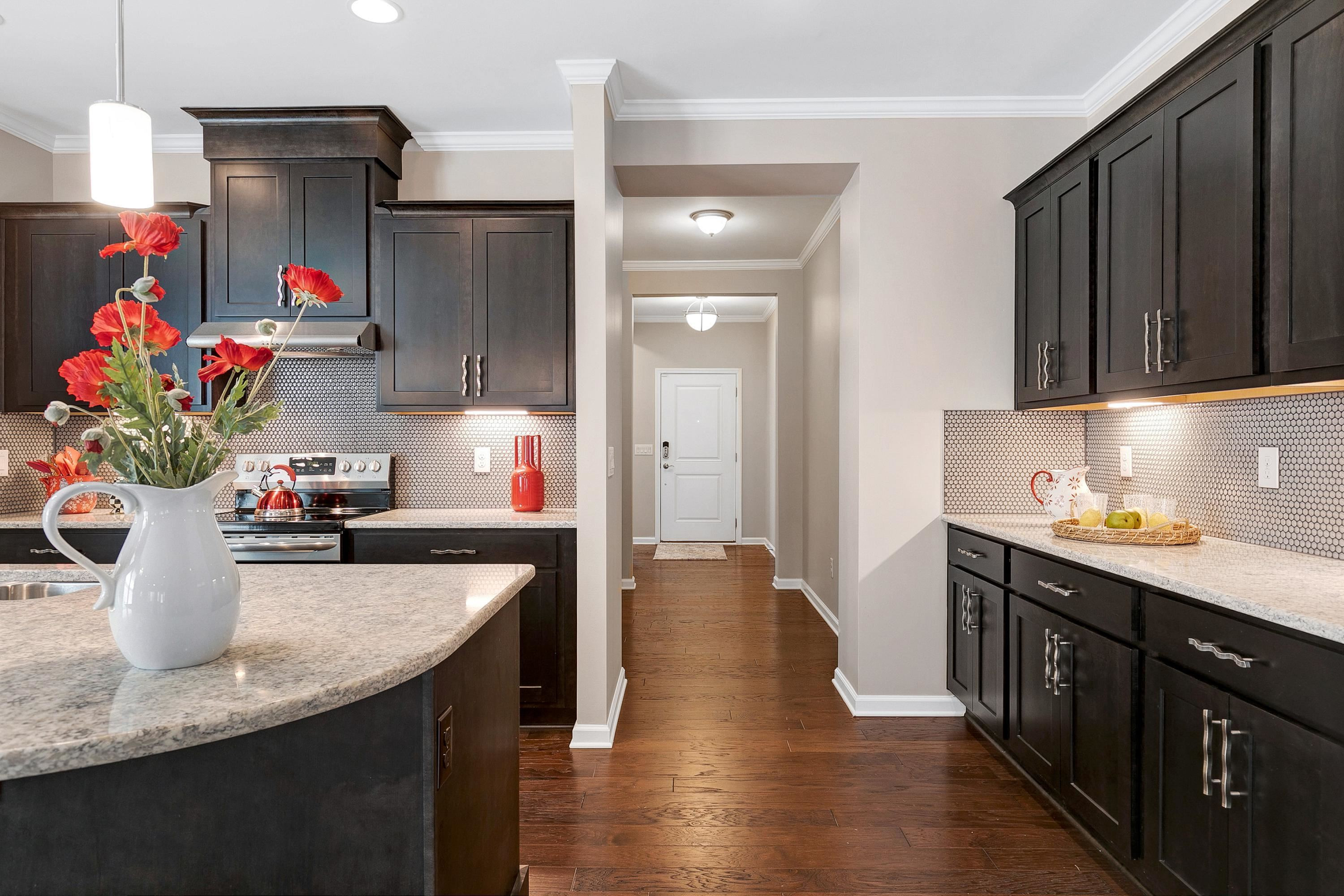 811 Atticus Way Durham, NC 27703 - Photo 2 of 33 a kitchen with sink and cabinets