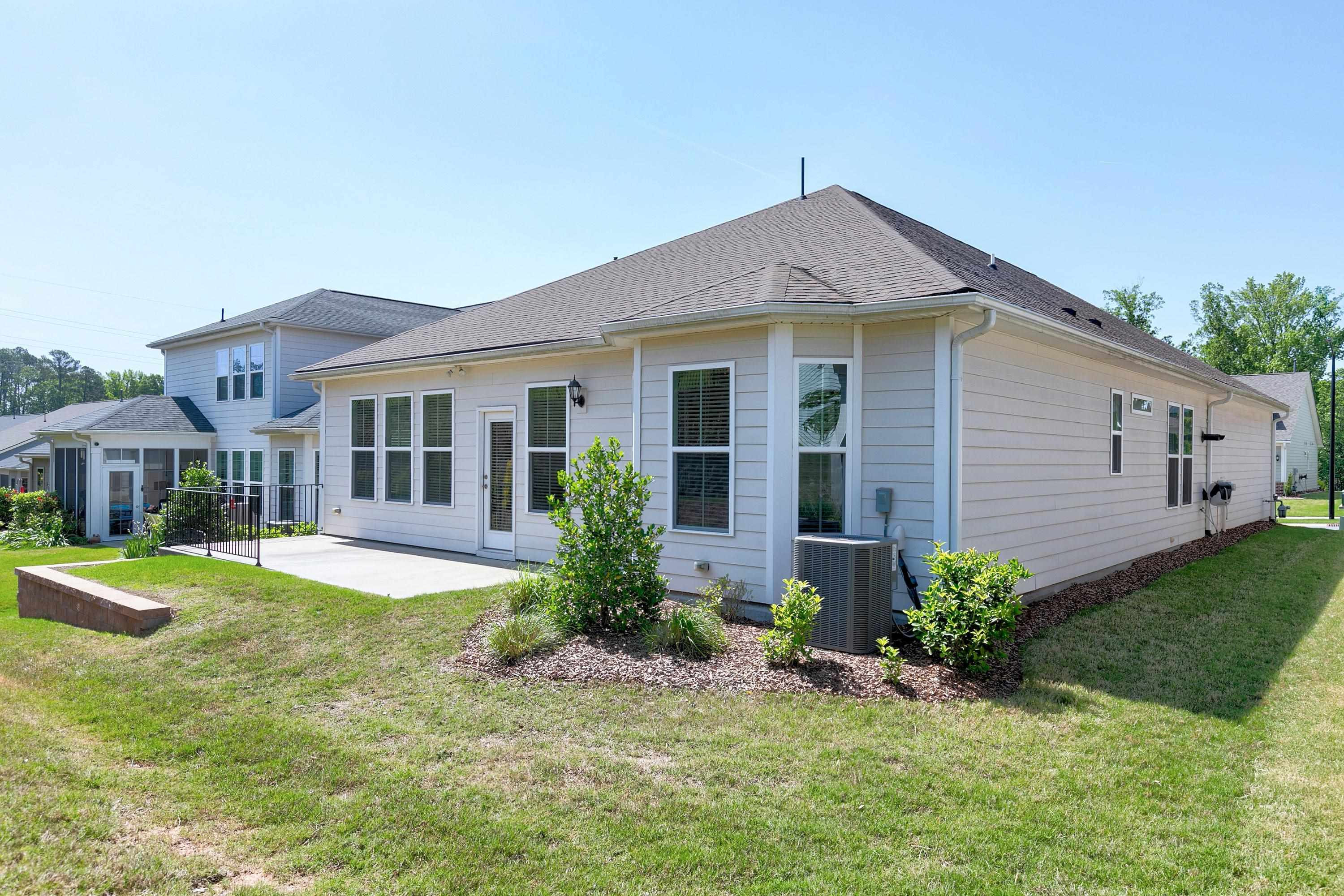 811 Atticus Way Durham, NC 27703 - Photo 28 of 33 a front view of a house with a yard