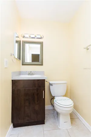 a bathroom with a toilet and a sink
