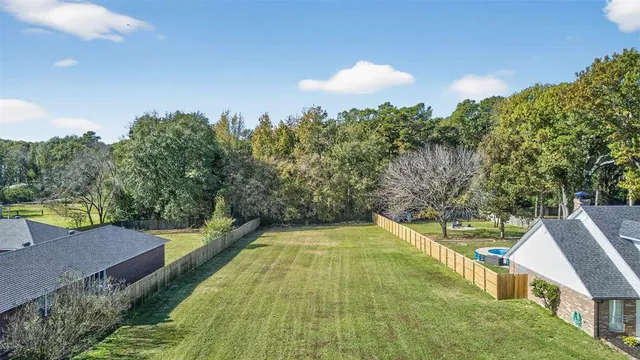 a view of swimming pool from a balcony