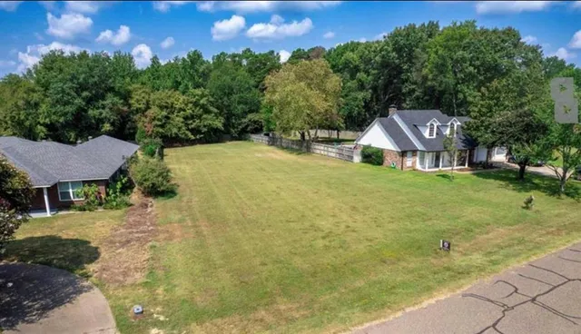 a house with a yard in front of it