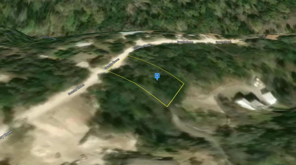 236 Country Haven Spring Branch, TX 78070 - Photo 2 of 4 a view of a yard