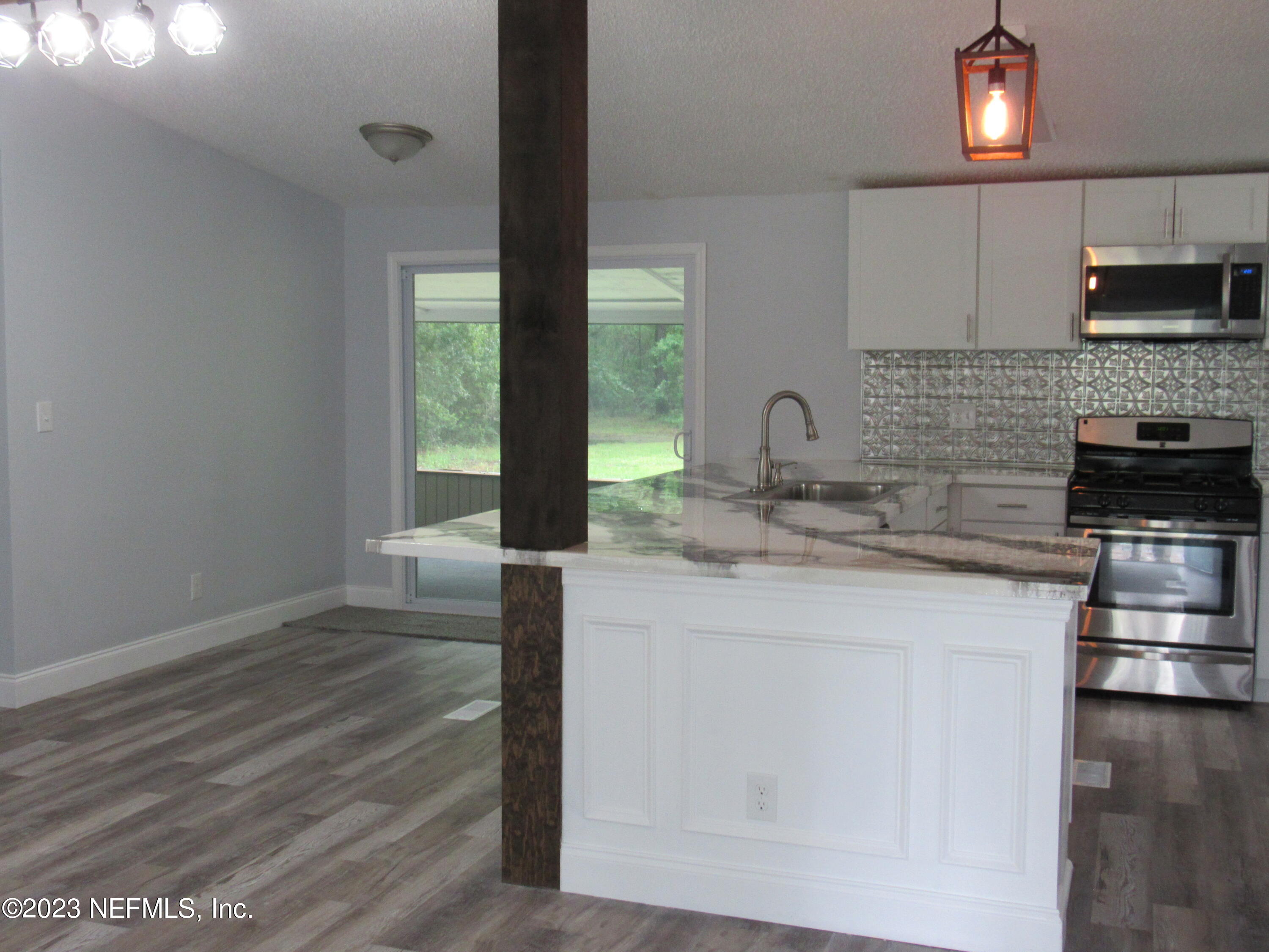 4042 Als Satch Road Middleburg, FL 32068 - Photo 6 of 25 KITCHEN/DINING