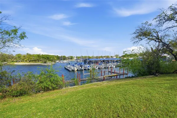 a view of a lake with a big yard