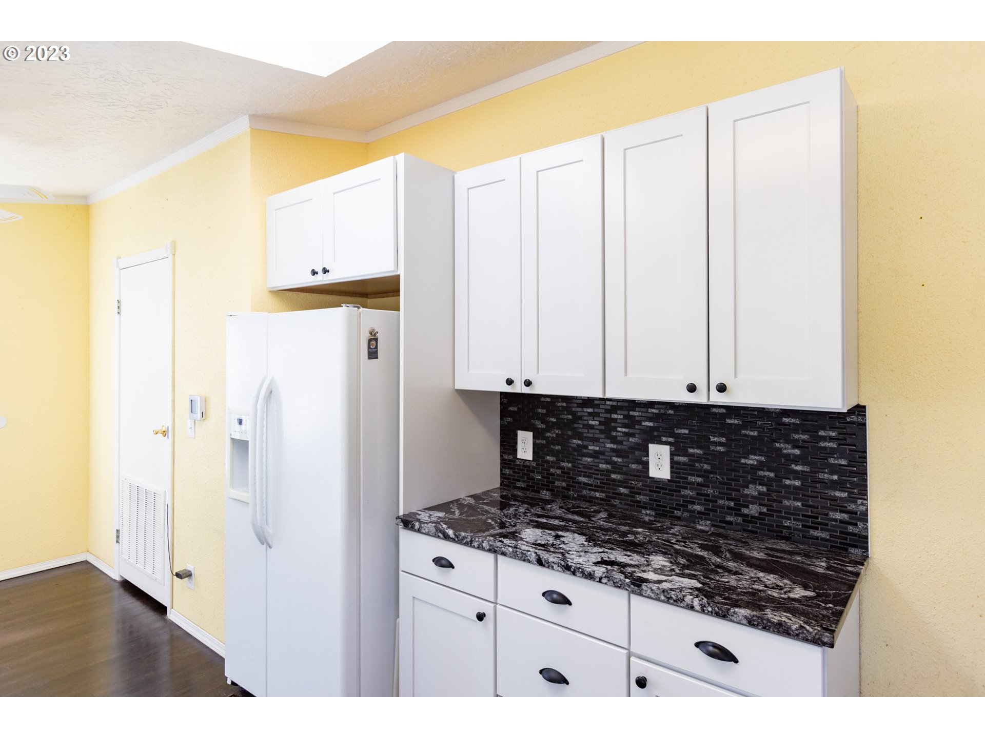 1045 Chenoweth Road The Dalles, OR 97058 - Photo 15 of 35 a kitchen with granite countertop a sink and a stove