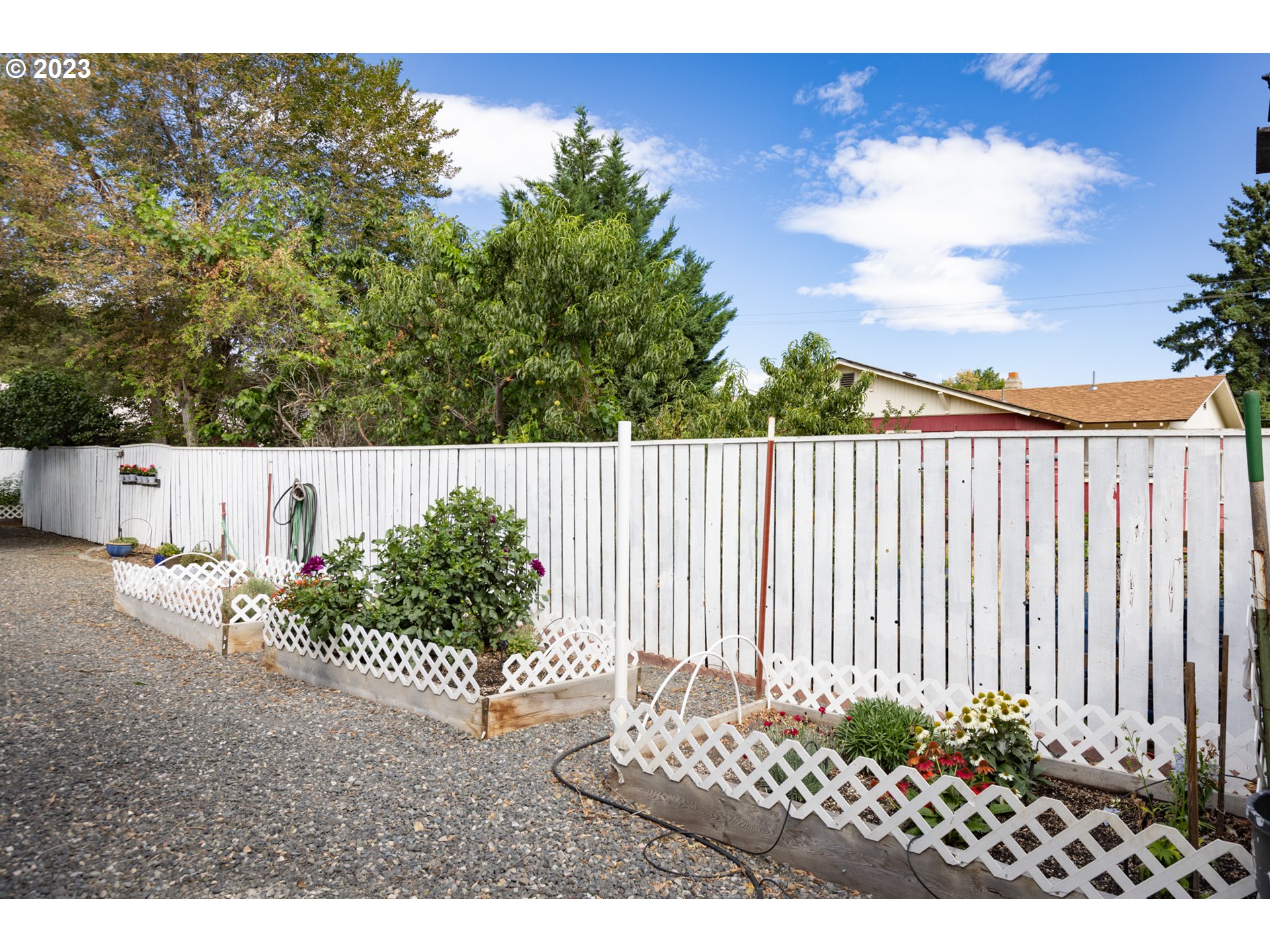 1045 Chenoweth Road The Dalles, OR 97058 - Photo 31 of 35 a view of a wooden fence