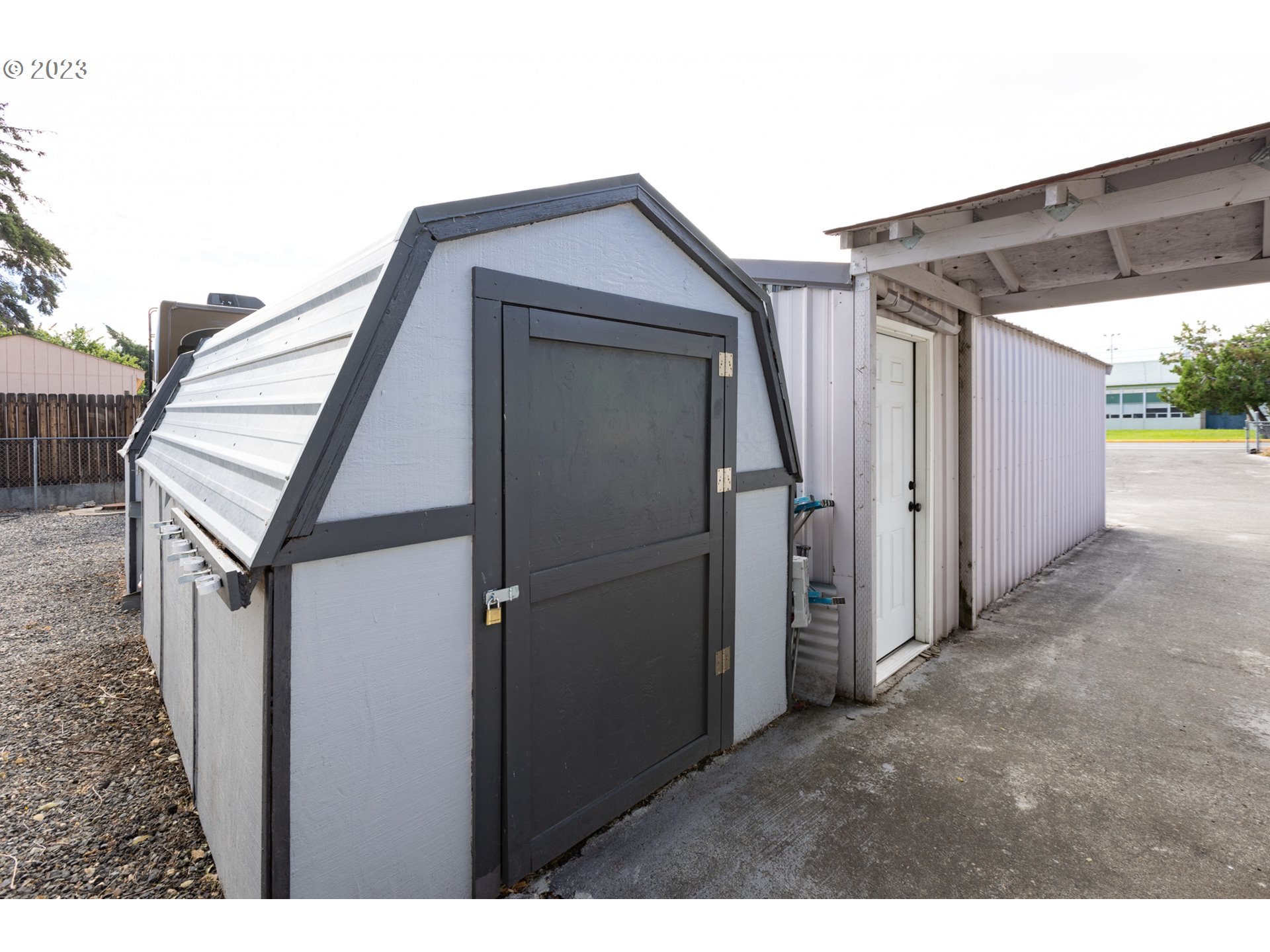 1045 Chenoweth Road The Dalles, OR 97058 - Photo 32 of 35 a view of a house with a backyard
