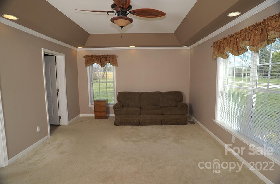 490 Cress Road Mount Ulla, NC 28125 - Photo 16 of 23 a living room with furniture and a large window