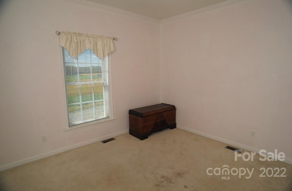 490 Cress Road Mount Ulla, NC 28125 - Photo 19 of 23 an empty room with a window