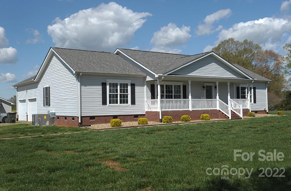 490 Cress Road Mount Ulla, NC 28125 - Photo 2 of 23 a front view of a house with a yard