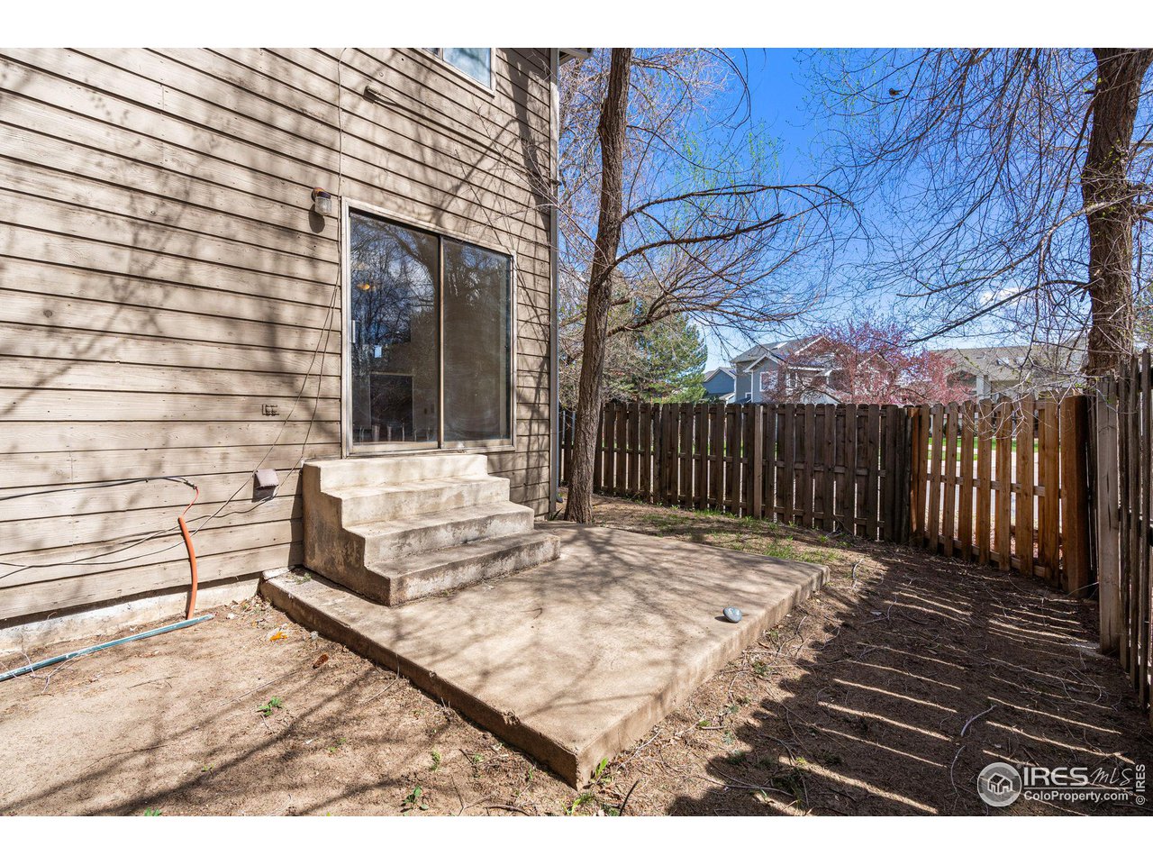 4640 Portside Way Boulder, CO 80301 - Photo 13 of 35 a view of a deck with wooden floor and fence
