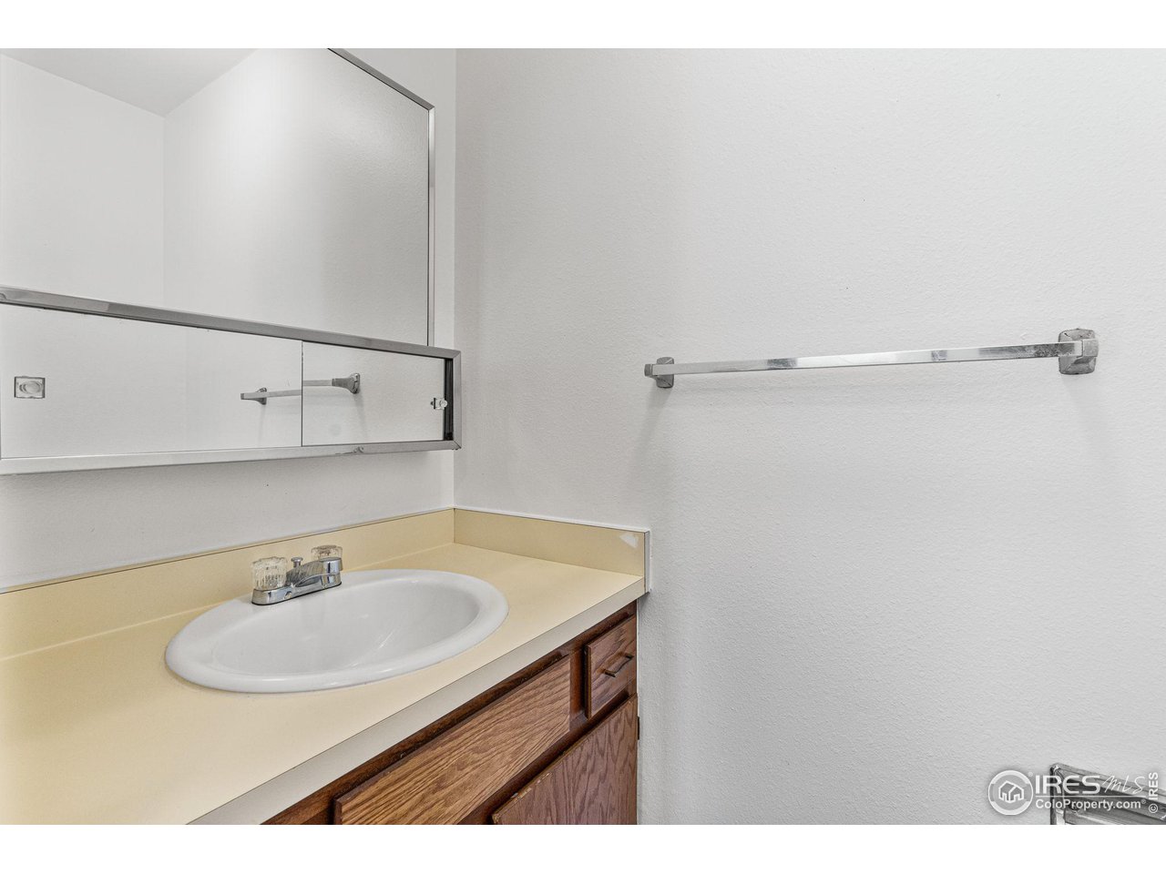 4640 Portside Way Boulder, CO 80301 - Photo 16 of 35 a bathroom with a sink and a mirror