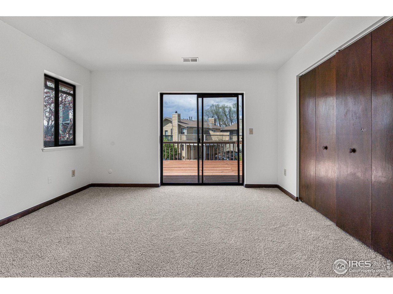 4640 Portside Way Boulder, CO 80301 - Photo 17 of 35 a view of an empty room with a window
