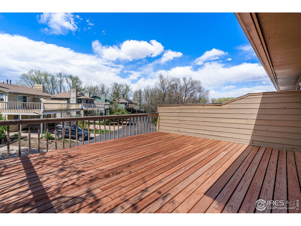 4640 Portside Way Boulder, CO 80301 - Photo 19 of 35 a view of a balcony with wooden floor