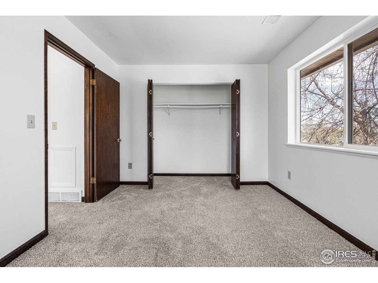 4640 Portside Way Boulder, CO 80301 - Photo 23 of 35 an empty room with windows and closet