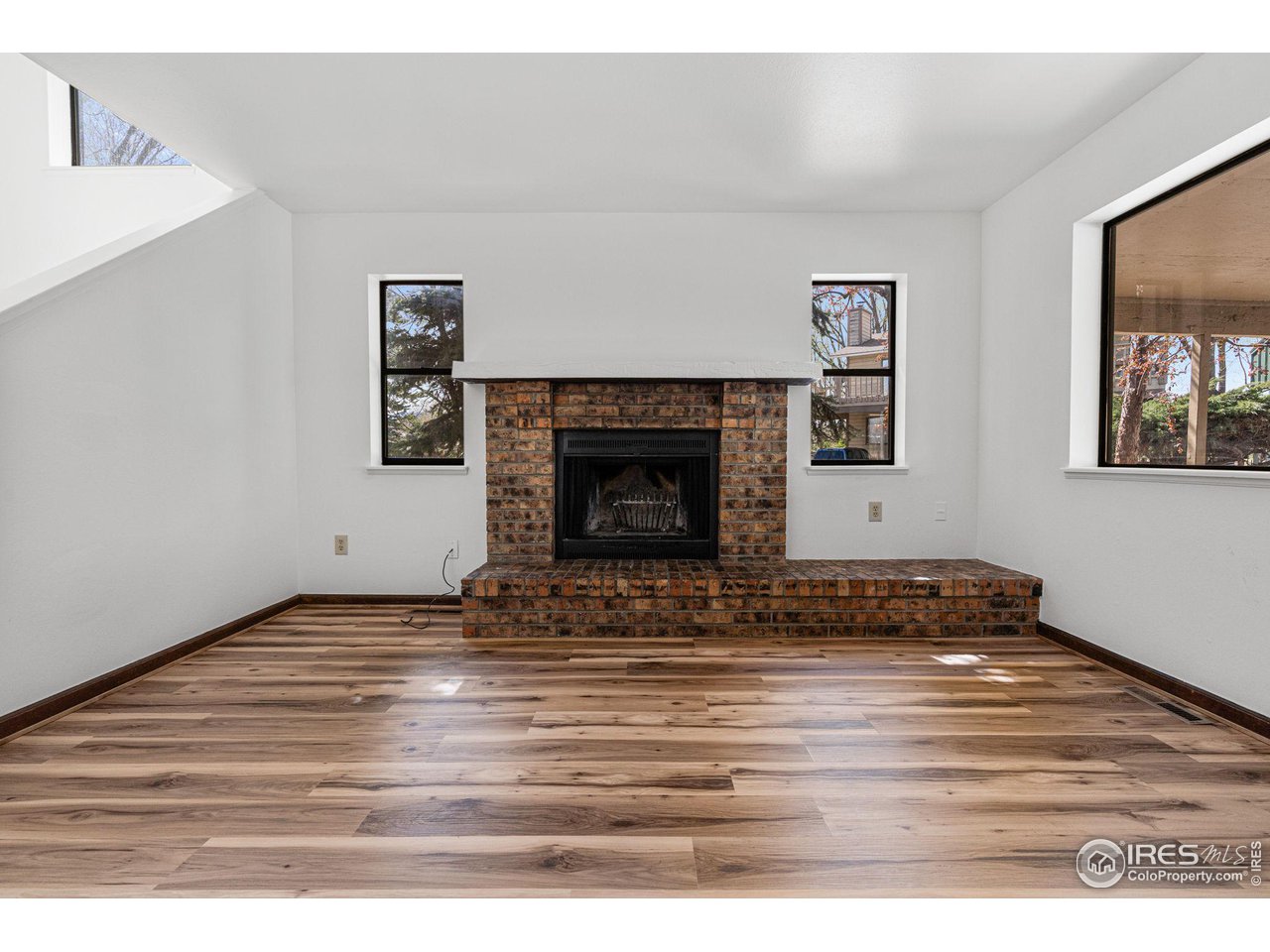 4640 Portside Way Boulder, CO 80301 - Photo 8 of 35 a view of empty room with wooden floor