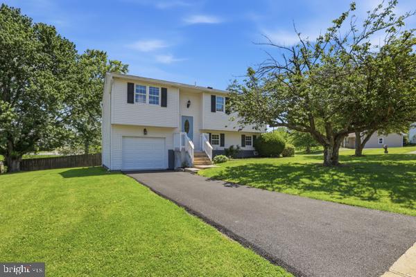 3496 Fox Ridge Court Dover, PA 17315 - Photo 2 of 35 a front view of a house with garden