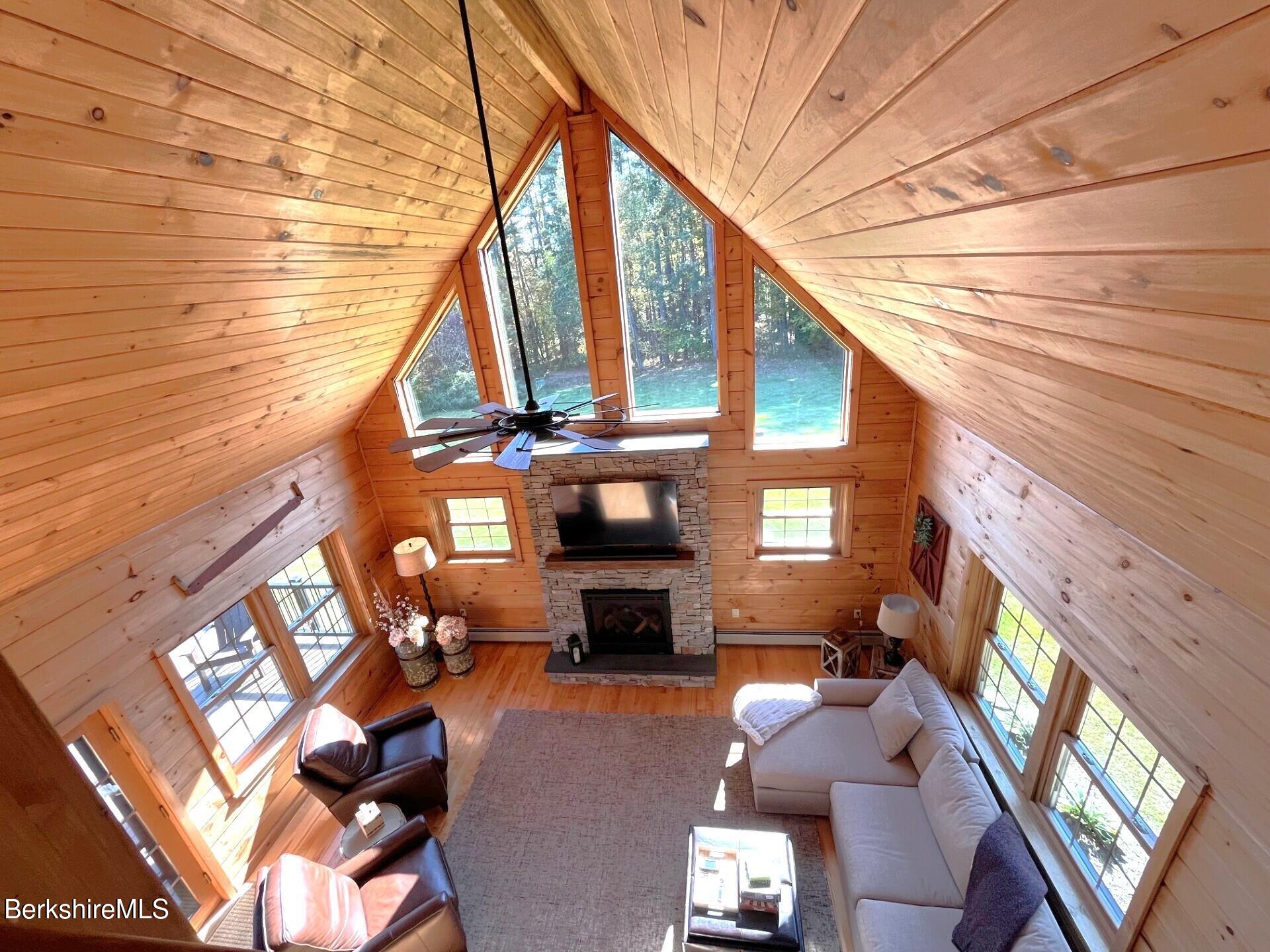 1020 Cascade Street Pittsfield, MA 01201 - Photo 31 of 75 a living room with furniture or fireplace and a wooden floor
