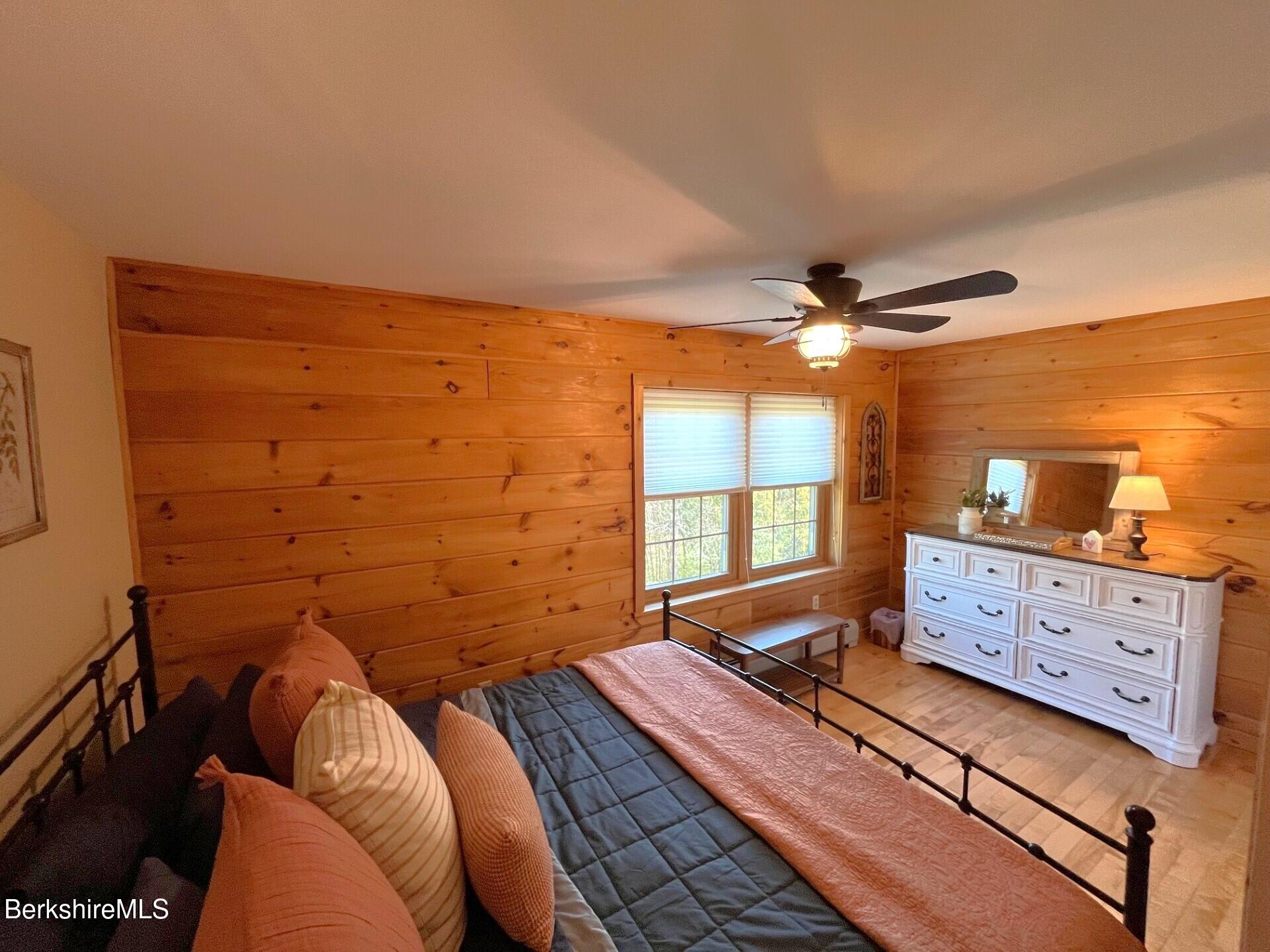 1020 Cascade Street Pittsfield, MA 01201 - Photo 38 of 75 a bed room with a bed and a dresser