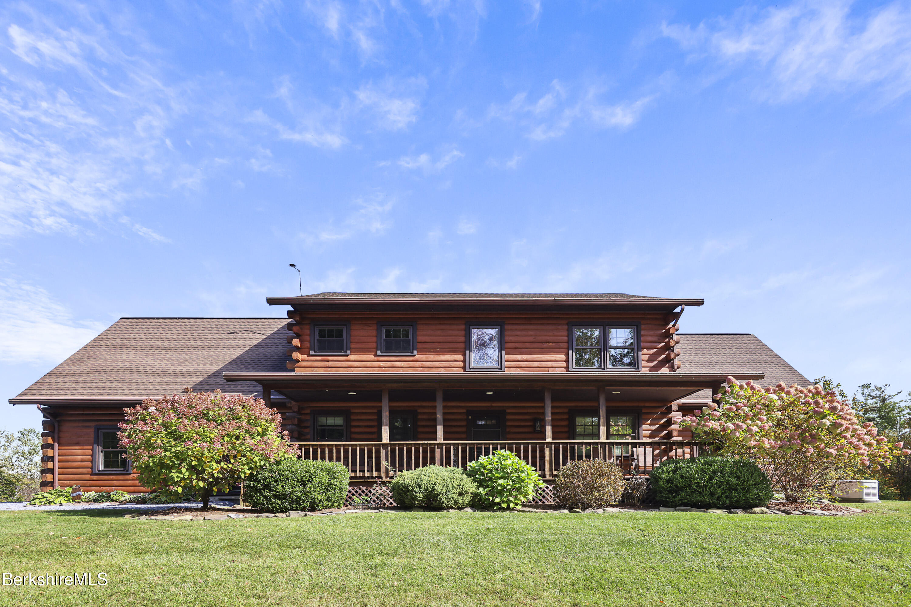 1020 Cascade Street Pittsfield, MA 01201 - Photo 4 of 75 a front view of a house with a yard