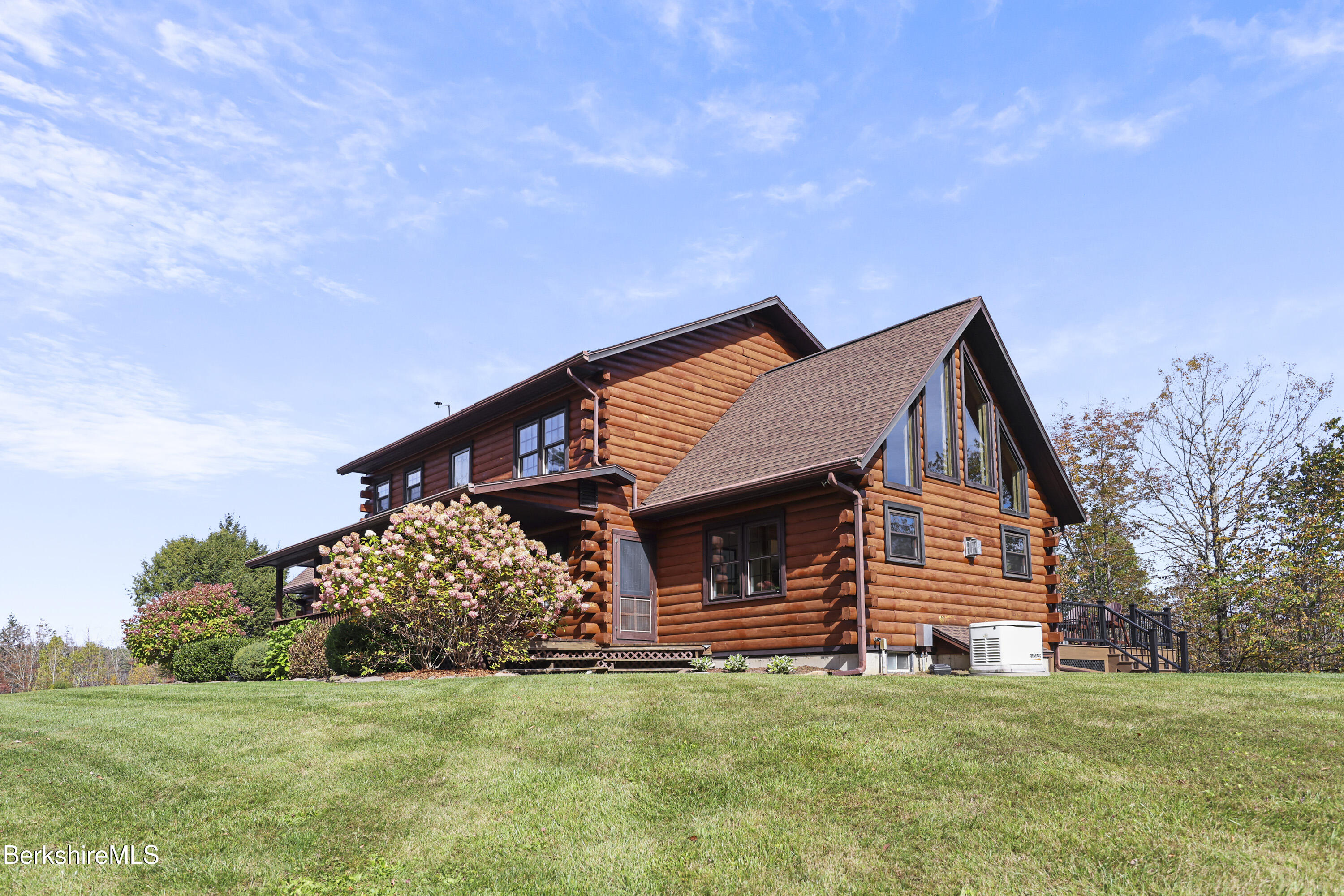 1020 Cascade Street Pittsfield, MA 01201 - Photo 5 of 75 a front view of a house with a garden